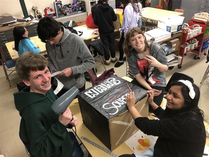 Students creating donation boxes; photo credit: Ms. Ingraham 